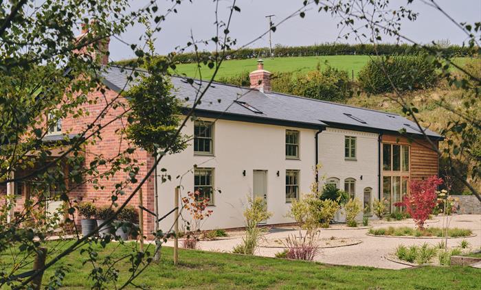 External shot of stone building retreat